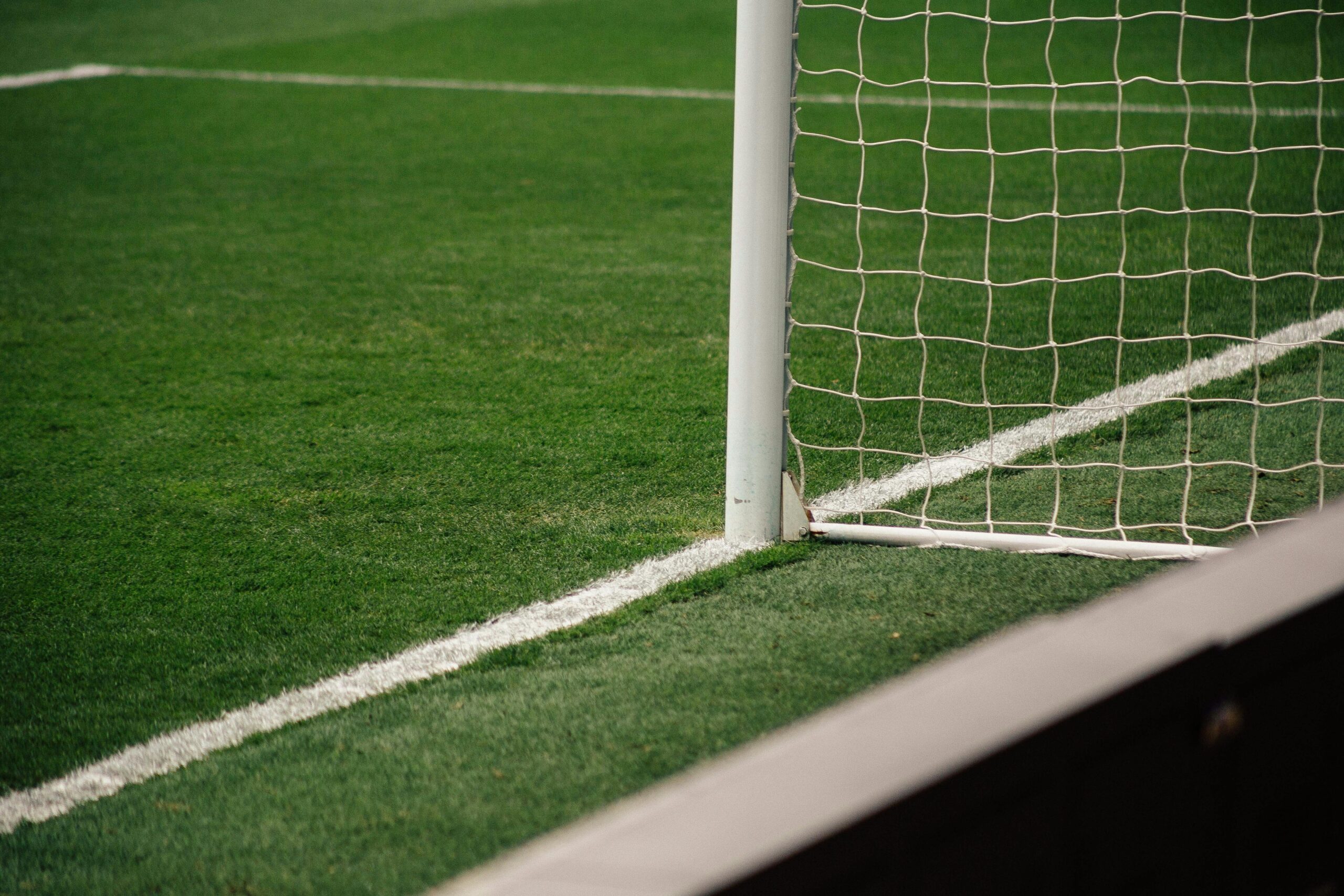 white soccer goal on focus photo