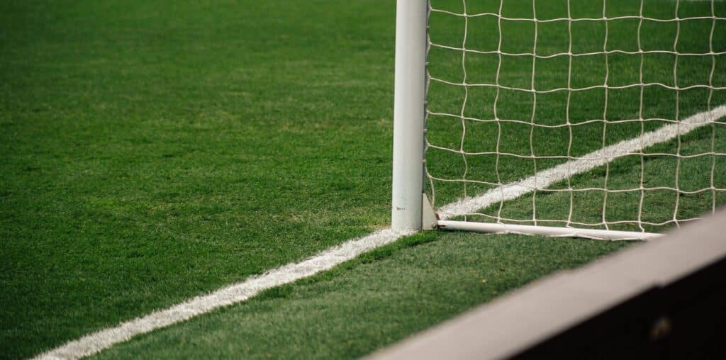 white soccer goal on focus photo